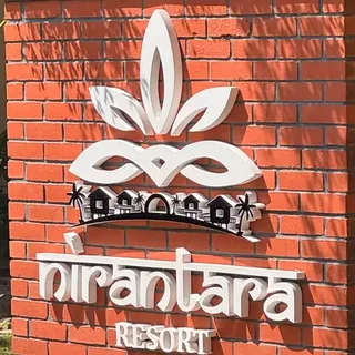 Nirantara Resort signage emblem